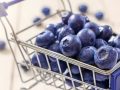 tiny shopping cart of blueberries