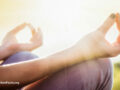 Woman in a meditative sitting stance