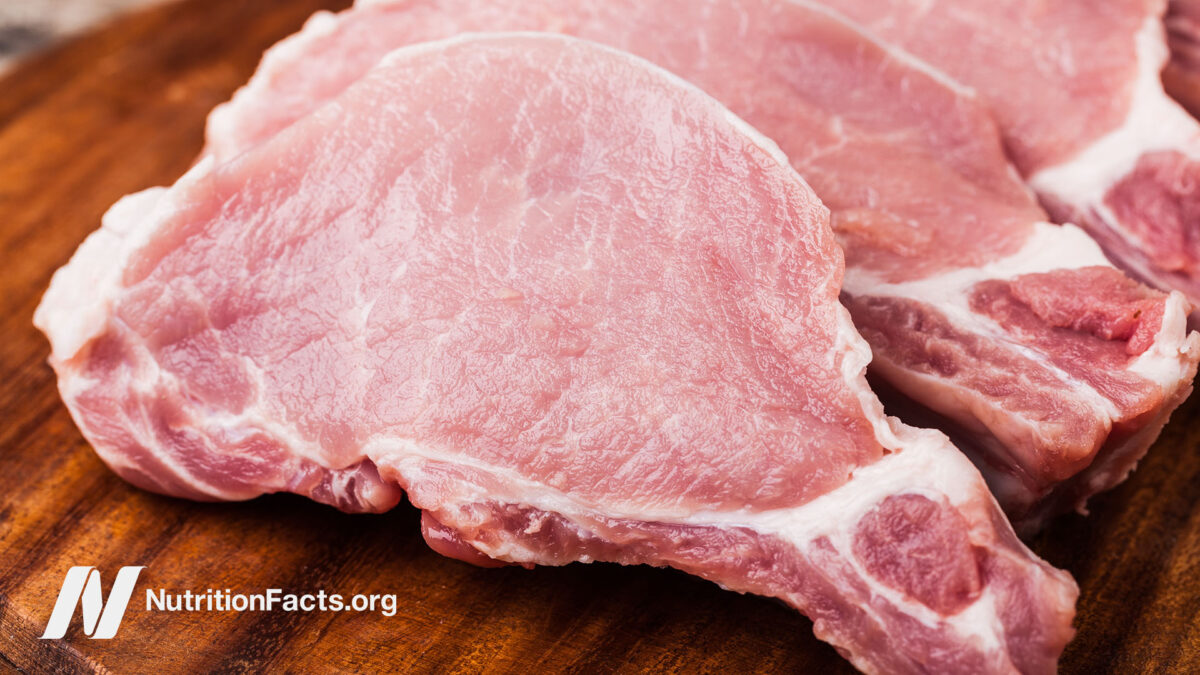 Raw pork meat on a cutting board