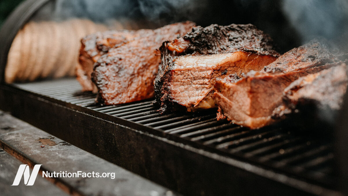Meat cooking on a grill