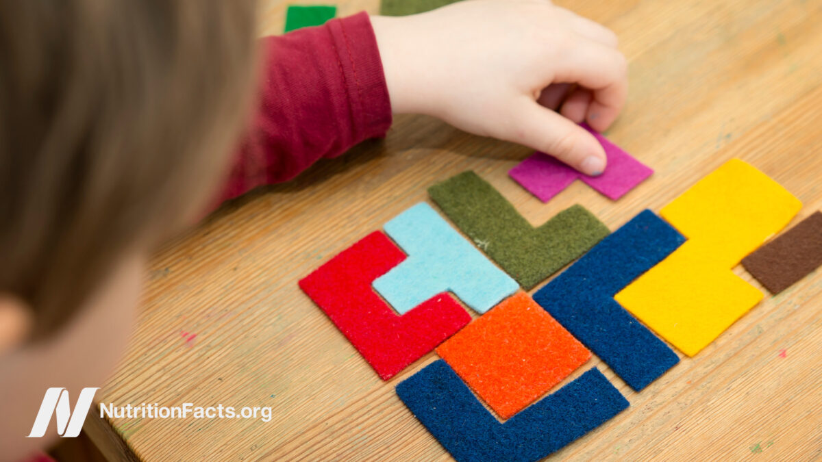 Child playing a mentally-stimulating game