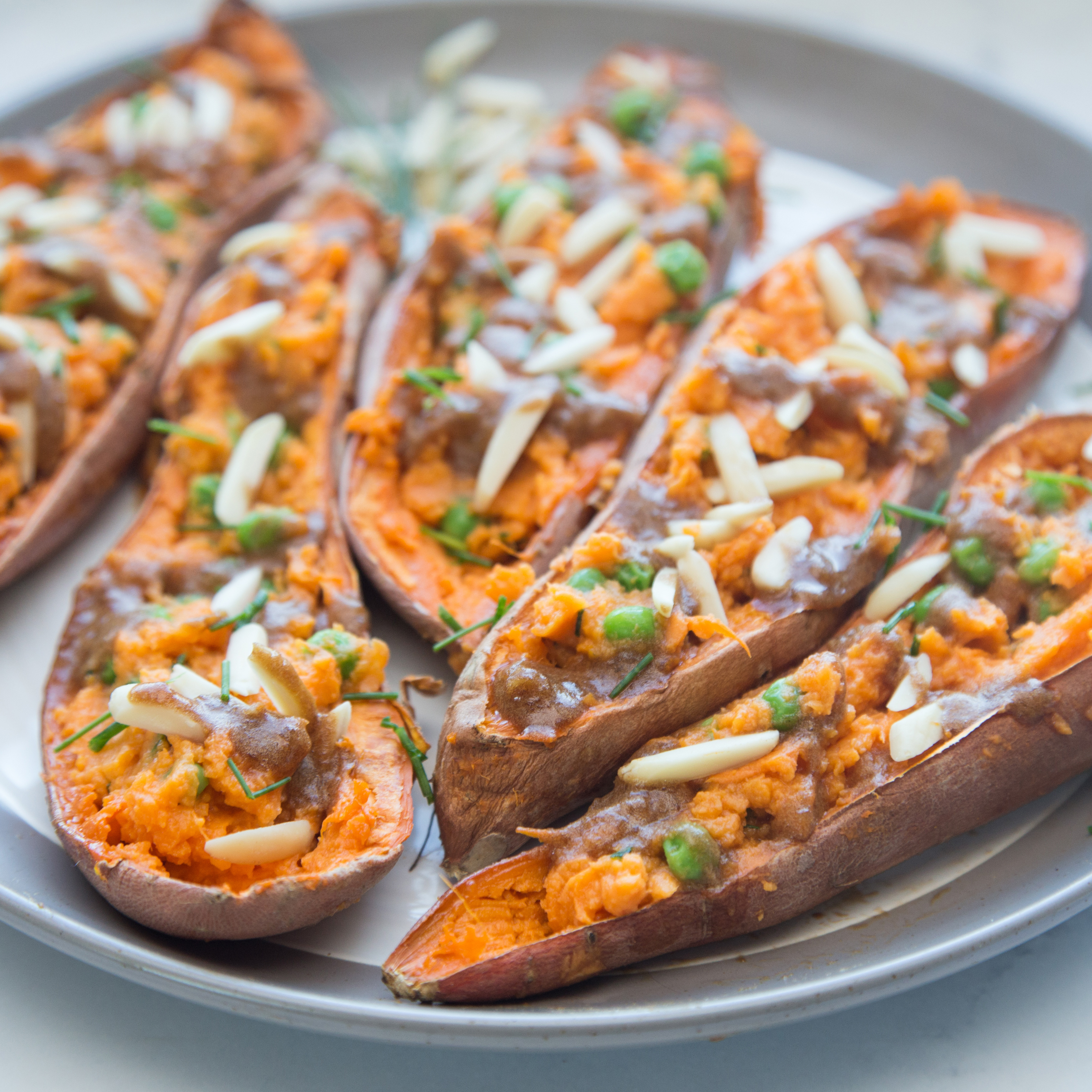 five stuffed roasted sweet potato halves