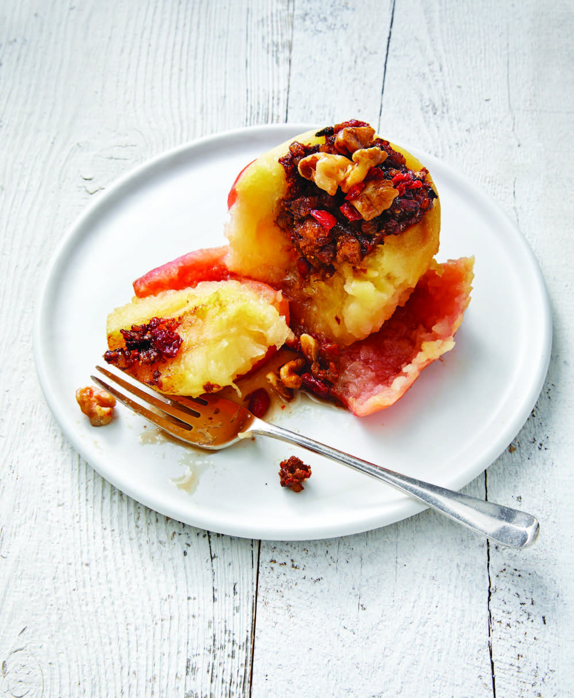 sliced baked apple with walnut and goji berry filling