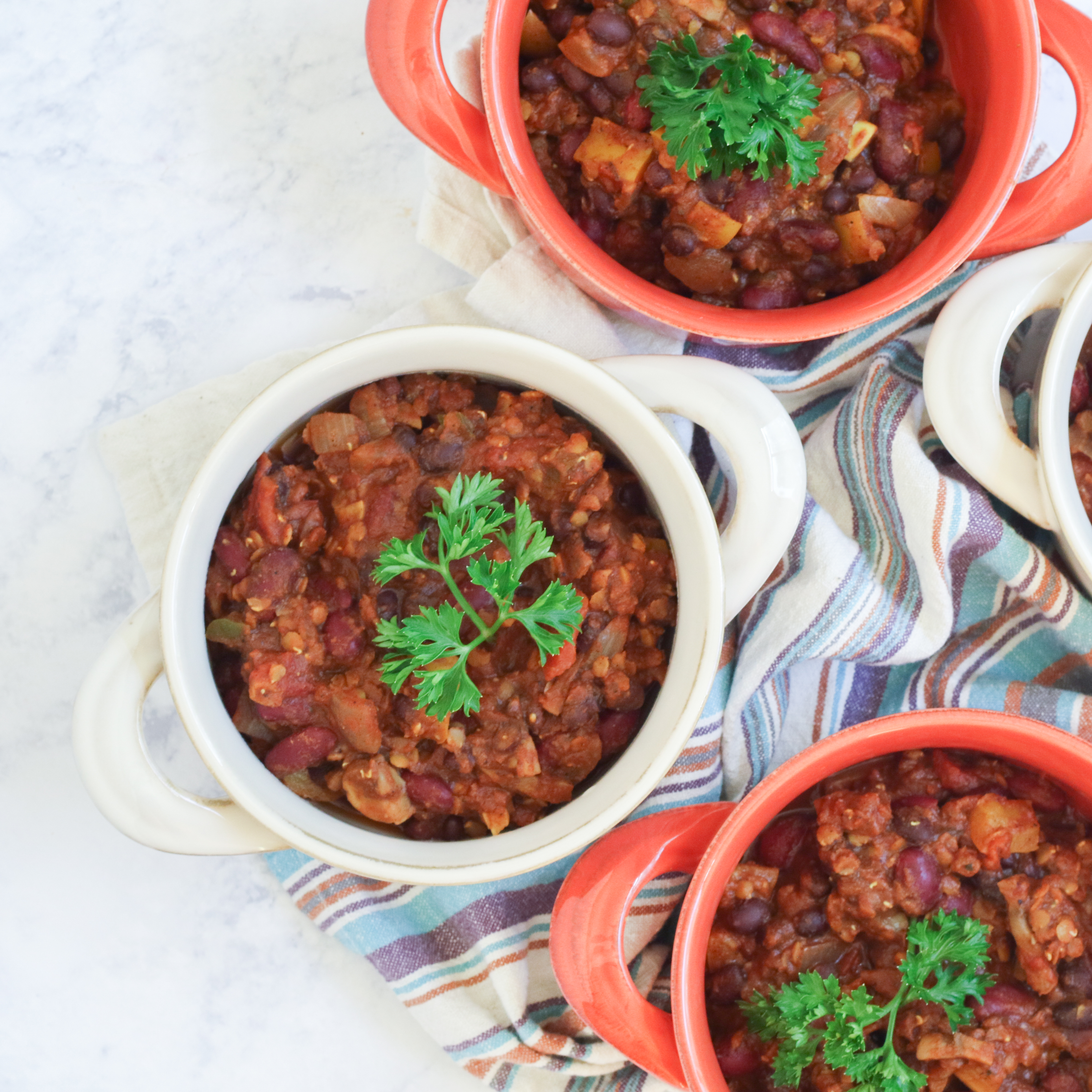 mini pots filled with bean chili