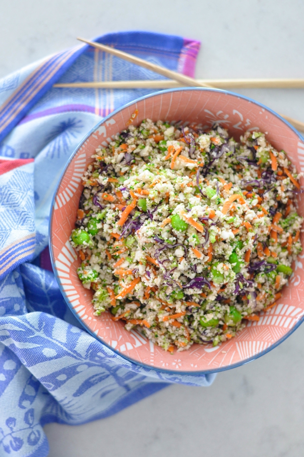 big bowl of rice cauliflower, edamame, and vegetable salad