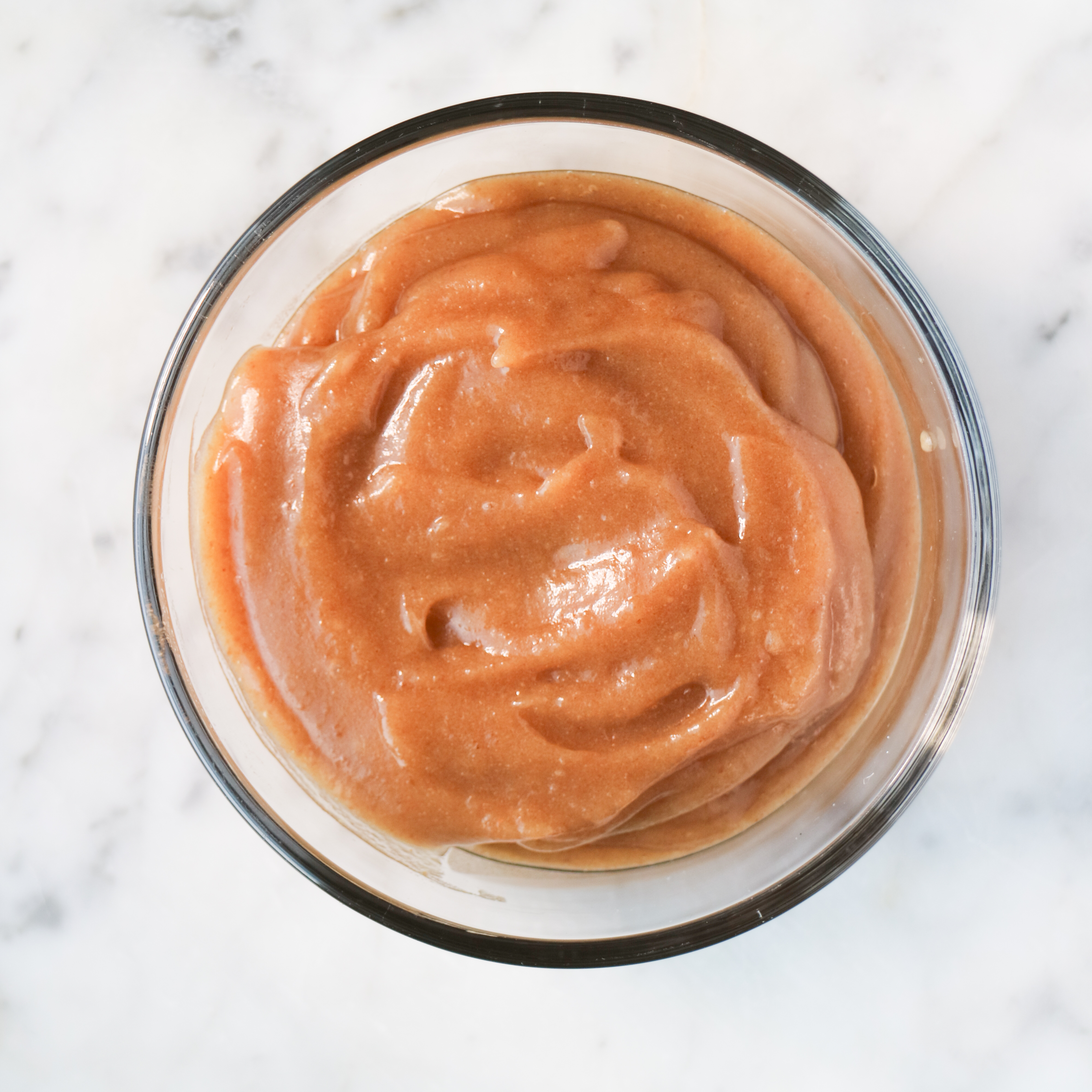 glass bowl filled with date syrup